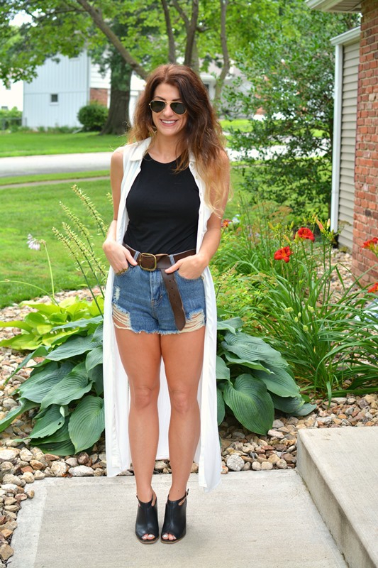 ashley from lsr, cutoff shorts, longline vest, leather mules