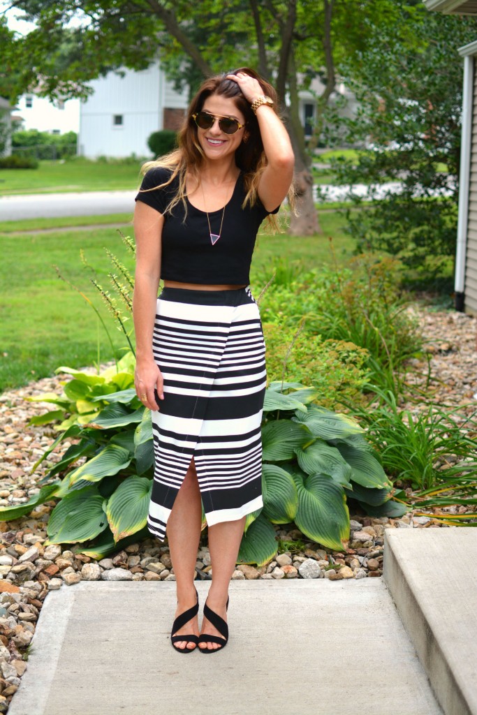 ashley from lsr in an asos crop top and striped midi skirt