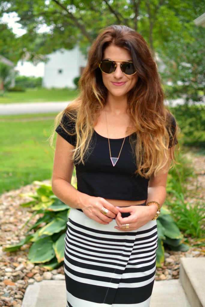 ashley from lsr in an asos crop top and striped midi skirt, illesteva sunglasses