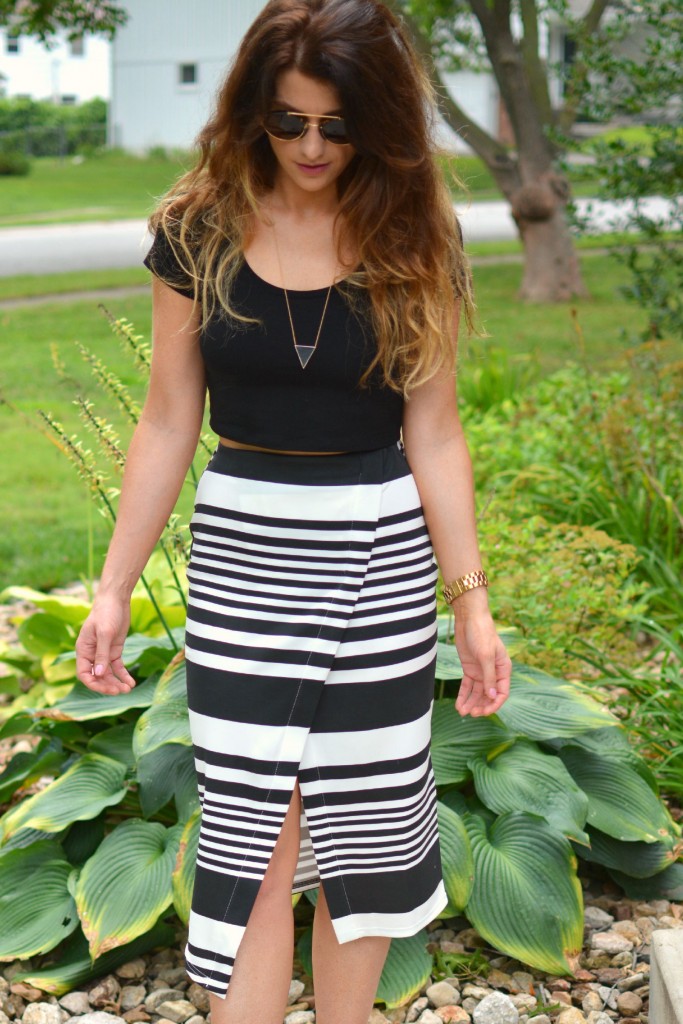 ashley from lsr in an asos crop top and striped midi skirt, illesteva sunglasses