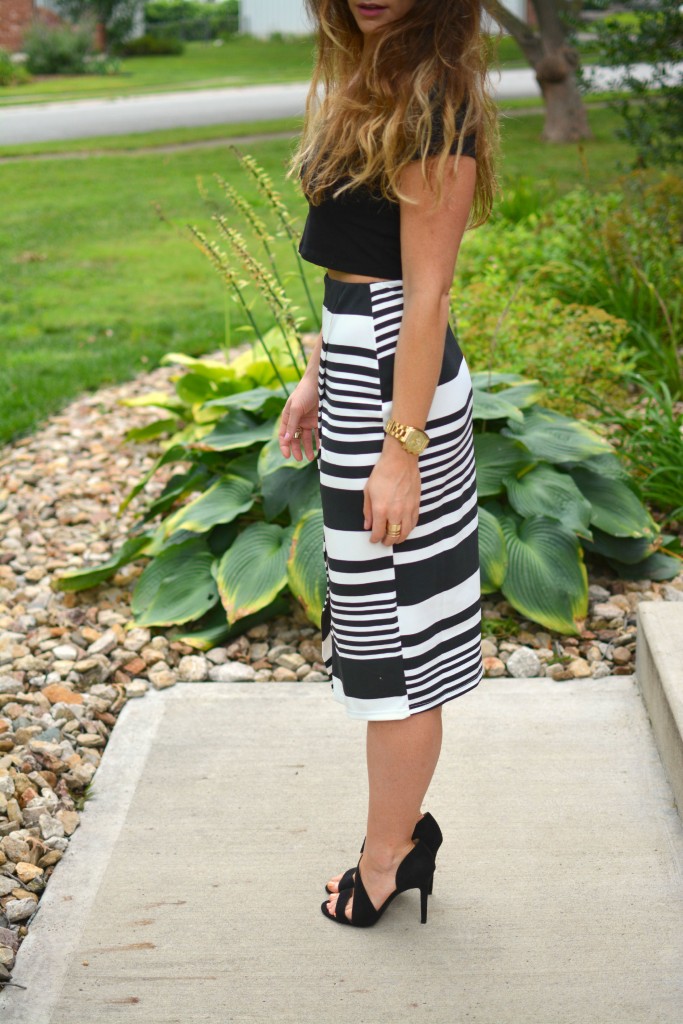 ashley from lsr in an asos crop top and striped midi skirt