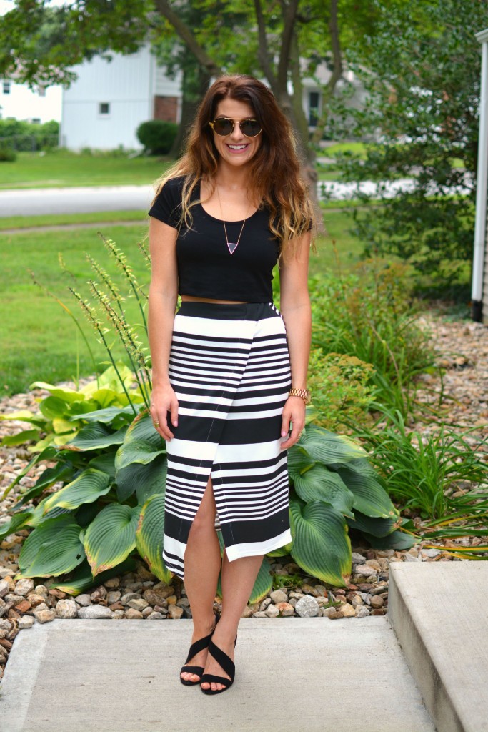 ashley from lsr in an asos crop top and striped midi skirt