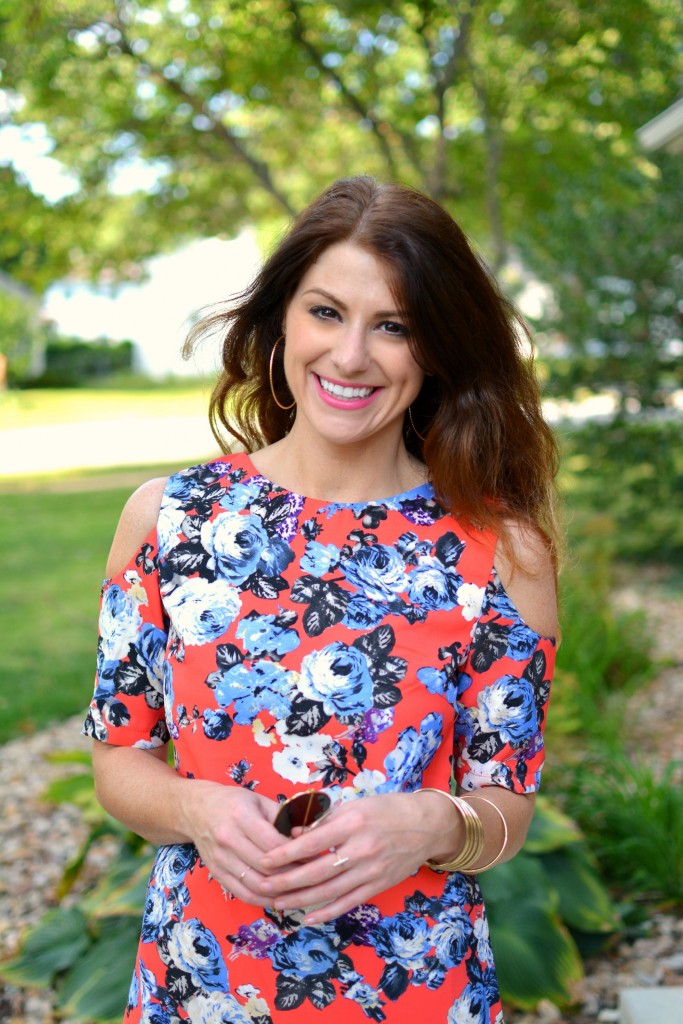 ashley from lsr in a coral floral dress and gorjana rings