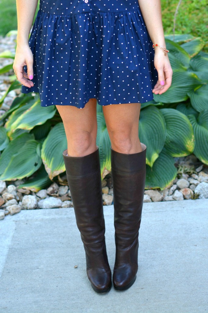 ashley from lsr in a navy polka dot dress and michael kors boots