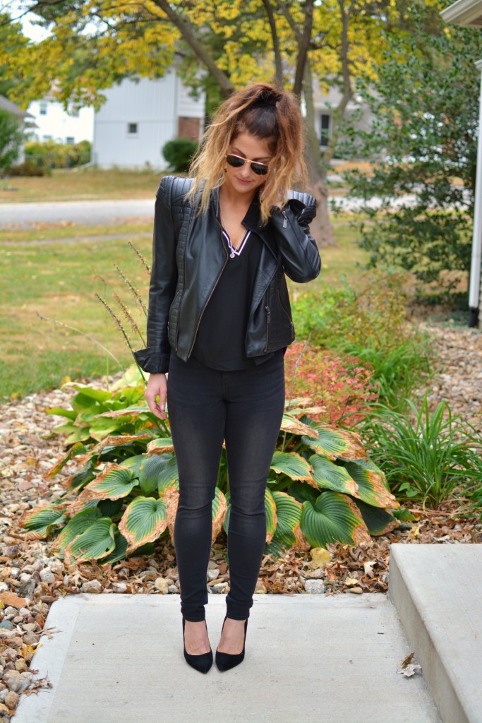 Ashley from LSR in a black leather jacket and black jeans with black suede pumps