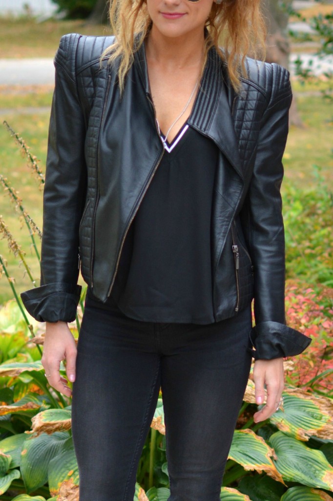 Ashley from LSR in a black leather jacket and black jeans.