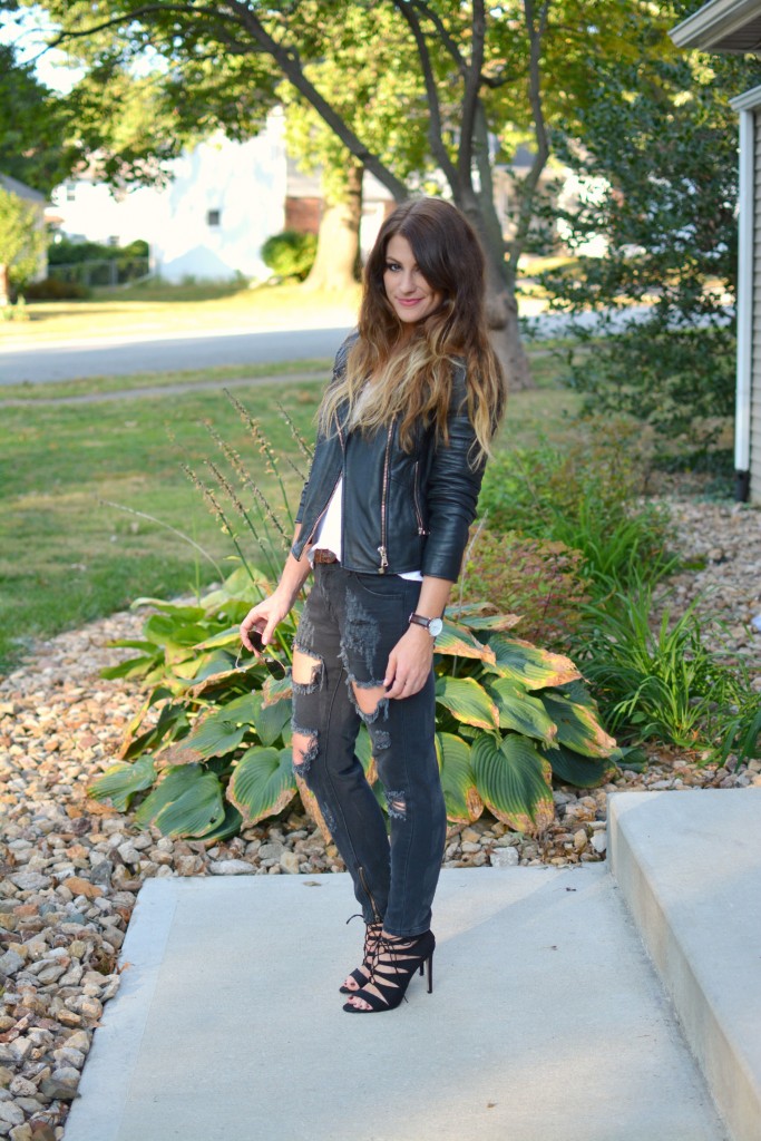 Ashley from LSR in One Teaspoon Freebirds, a River Island leather jacket, and Madden Girl cage sandals.