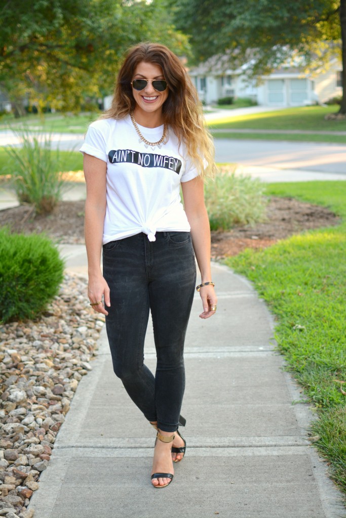 Ashley from LSR in an Ain't No Wifey tee, Madewell jeans, and Topshop sandals.