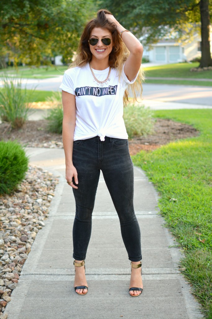 Ashley from LSR in an Ain't No Wifey tee, Madewell jeans, and Topshop sandals.