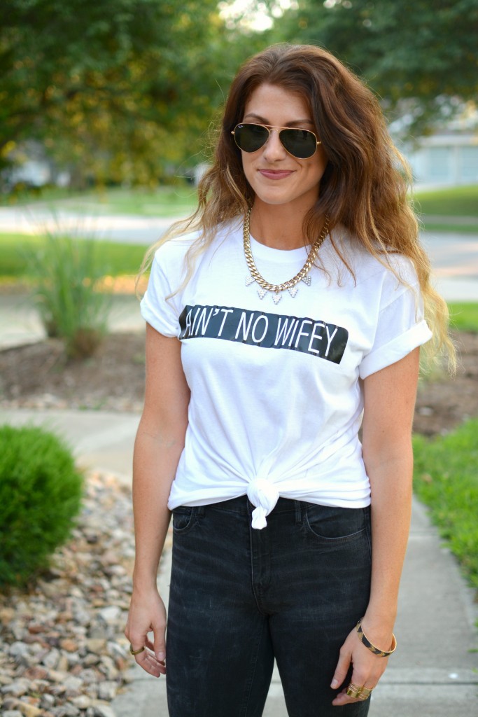 Ashley from LSR in an Ain't No Wifey tee and Madewell jeans.