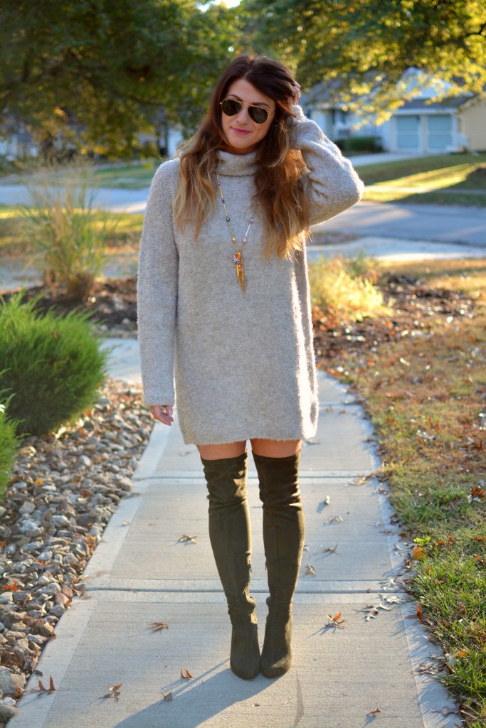 Ashley from LSR in a slouchy beige sweater and olive green over the knee boots.