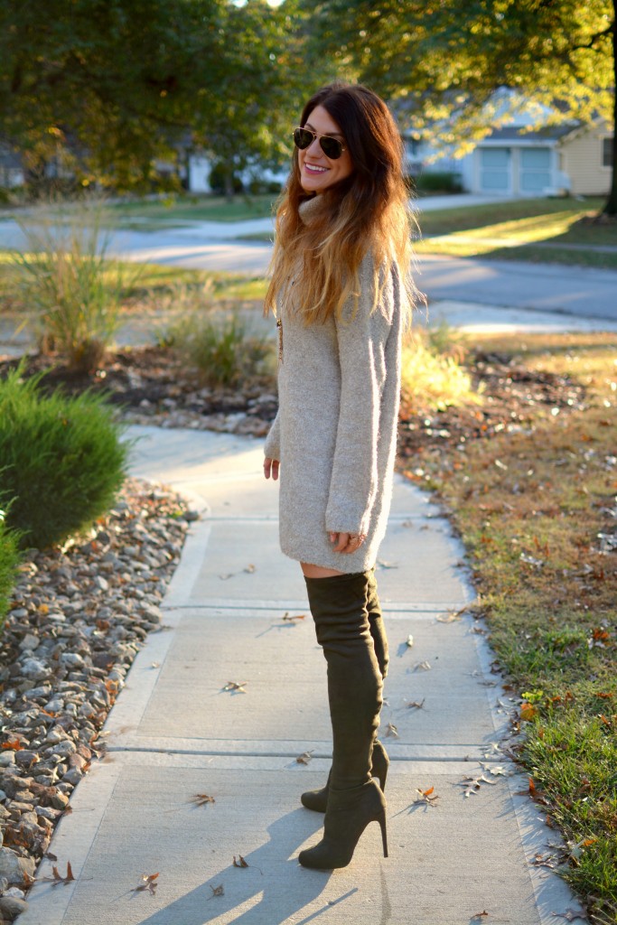 Ashley from LSR in a slouchy beige sweater and olive green over the knee boots.