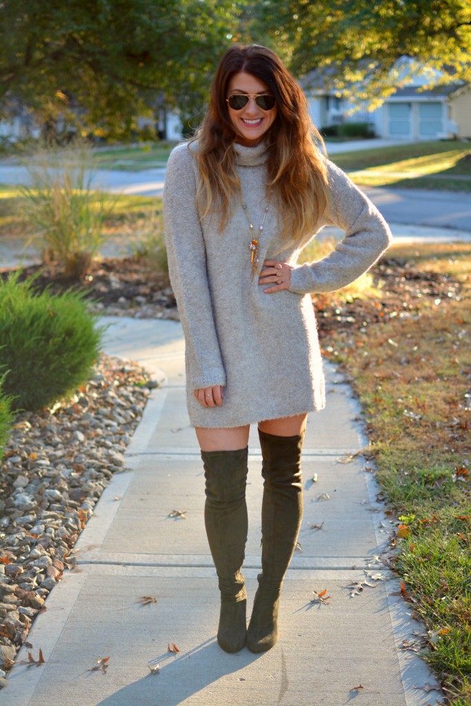 Ashley from LSR in a slouchy beige sweater and olive green over the knee boots.