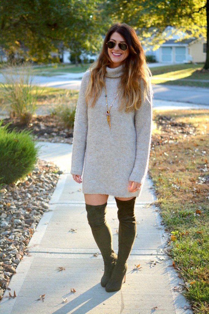 Ashley from LSR in a slouchy beige sweater and olive green over the knee boots.