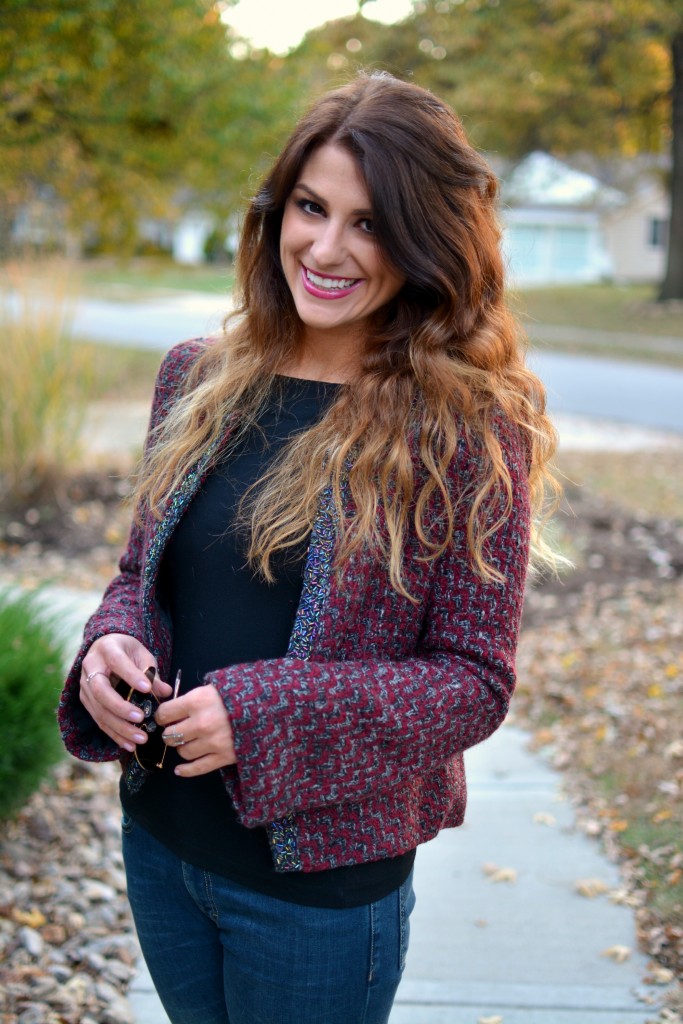 Ashley from LSR in a tweed jacket and black top.