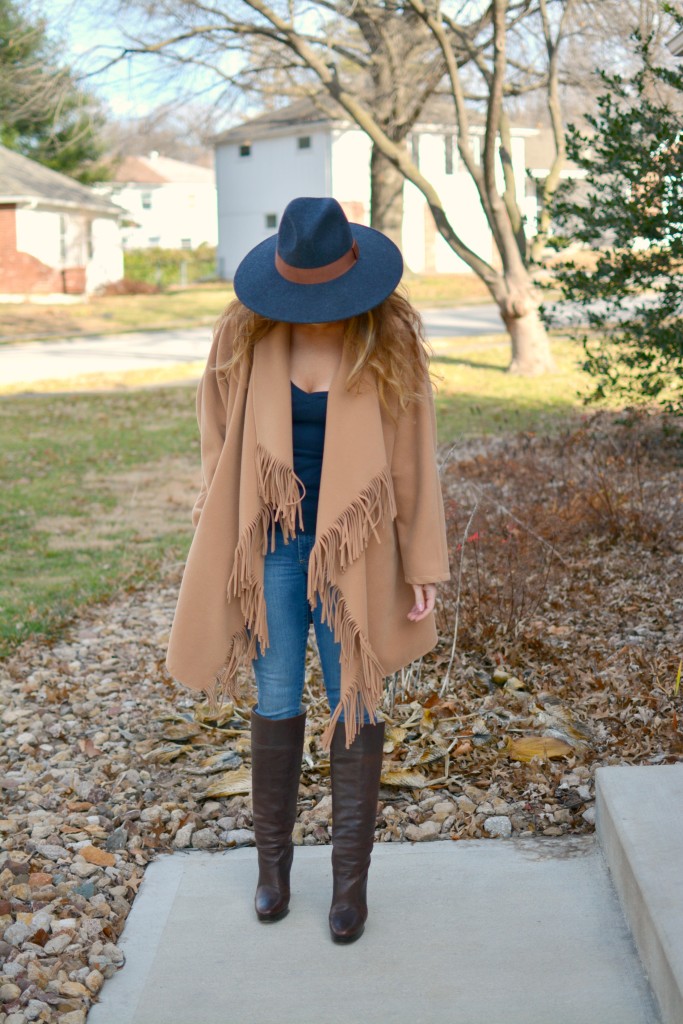 Ashley from LSR in a JOA fringe coat and Michael Kors boots.