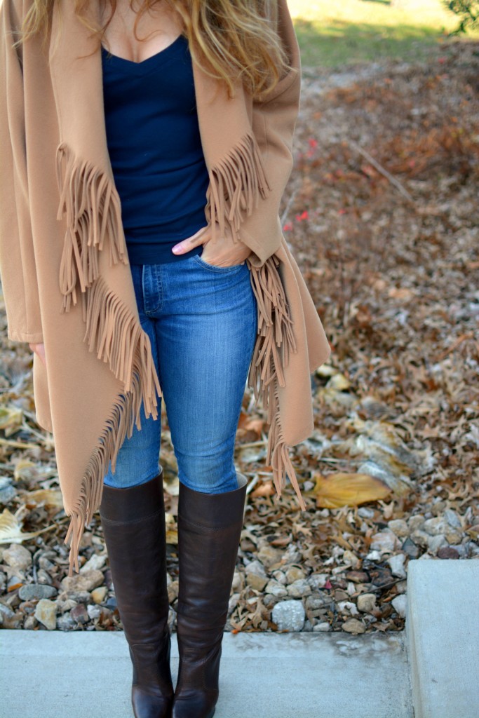 Ashley from LSR in a JOA fringe coat and Michael Kors boots.