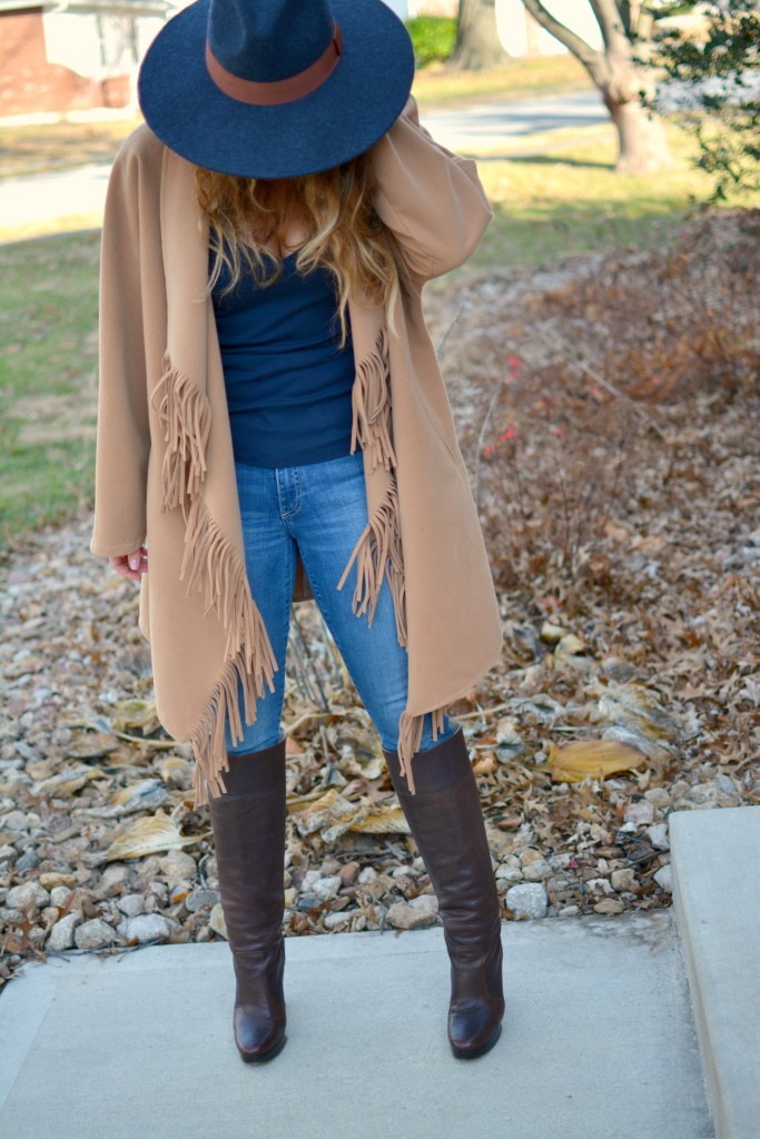 Ashley from LSR in a JOA fringe coat and Michael Kors boots.