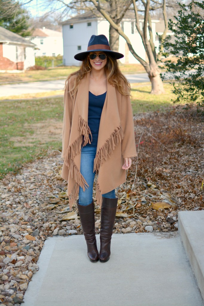 Ashley from LSR in a JOA fringe coat and Michael Kors boots.