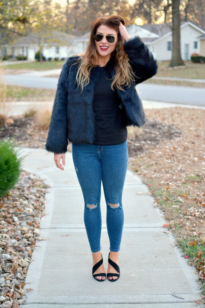 Ashley from LSR in a navy faux fur coat and heels from H&M.