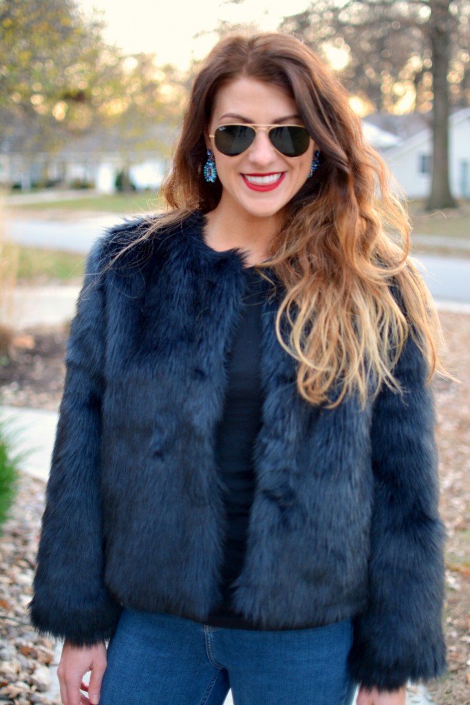 Ashley from LSR in a navy faux fur coat.