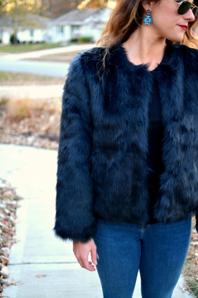 Ashley from LSR in a navy faux fur coat.