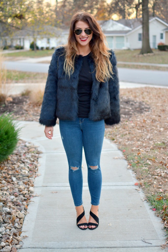 Ashley from LSR in a navy faux fur coat and heels from H&M.