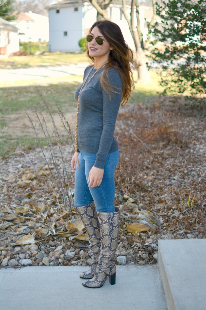 Ashley from LSR in a gray sweater and Sam Edelman Rylan boots