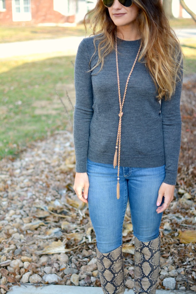 Ashley from LSR in a gray sweater and Sam Edelman Rylan boots