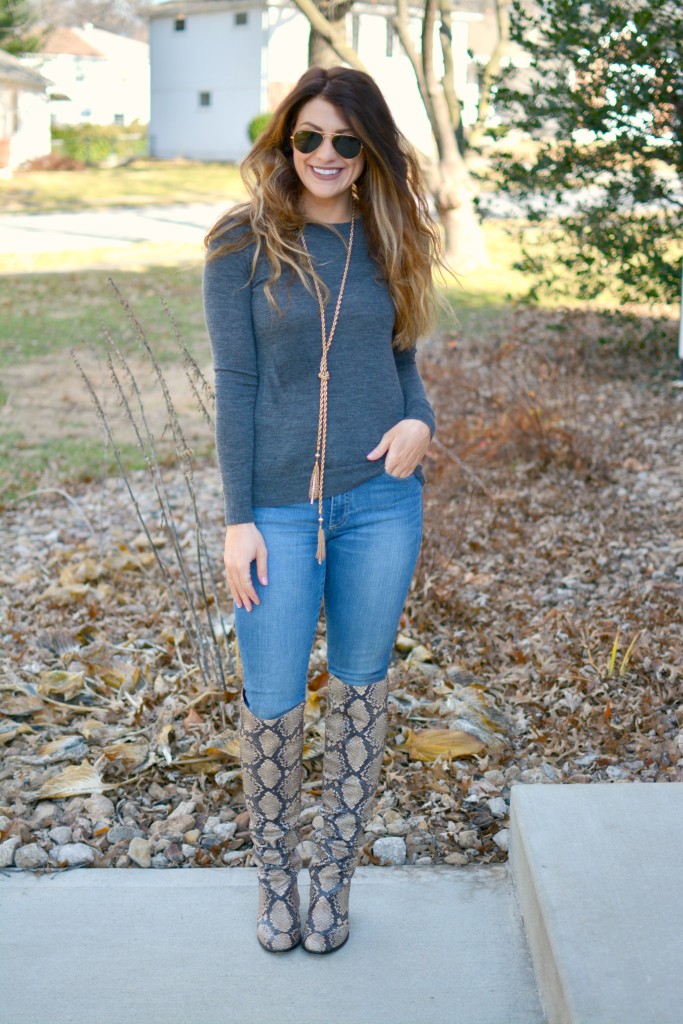 Ashley from LSR in a gray sweater and Sam Edelman Rylan boots