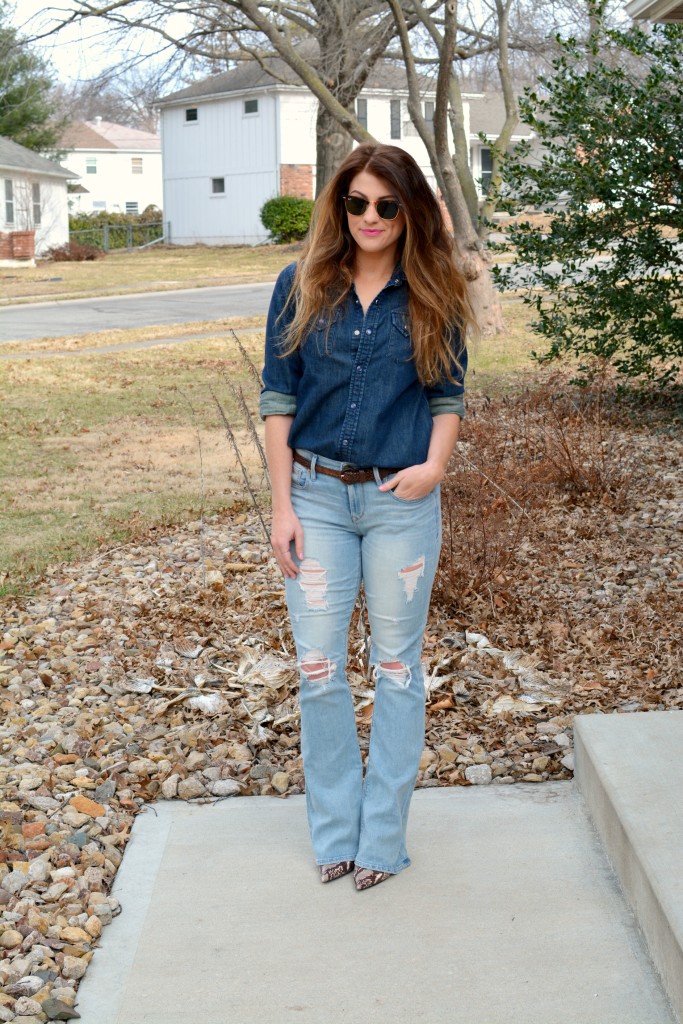 Ashley from LSR in Ray-Ban Clubmaster sunglasses, flare jeans, and a denim shirt