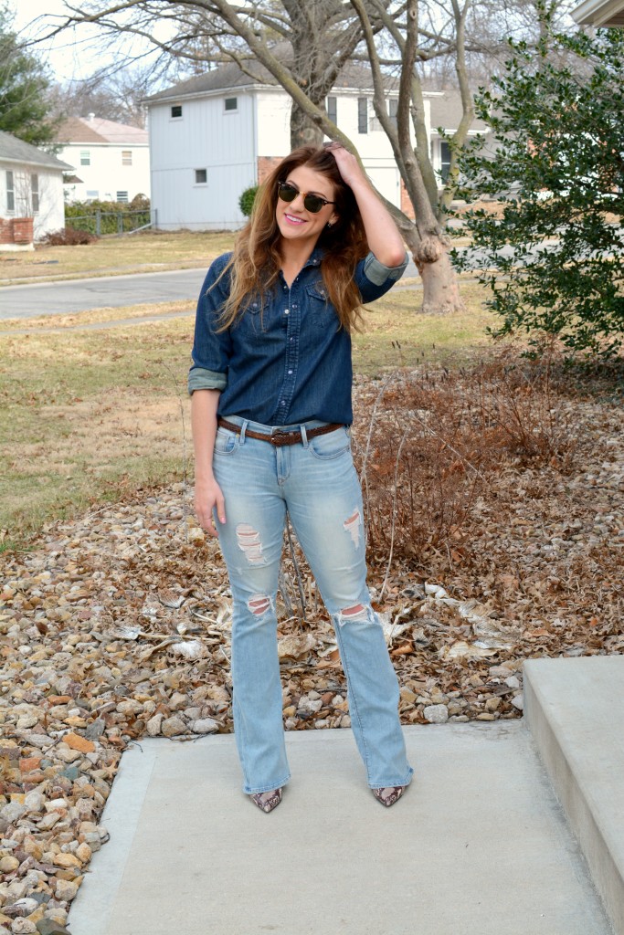 Ashley from LSR in Ray-Ban Clubmaster sunglasses, flare jeans, and a denim shirt