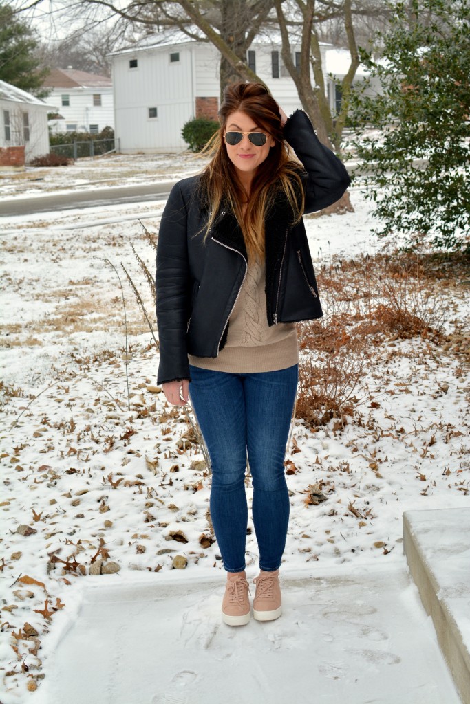 Ashley from LSR in rose quartz sneakers and a shearling moto jacket