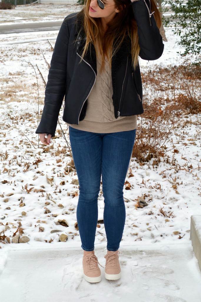 Ashley from LSR in rose quartz sneakers and a shearling moto jacket