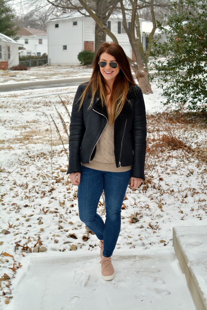 Ashley from LSR in rose quartz sneakers and a shearling moto jacket