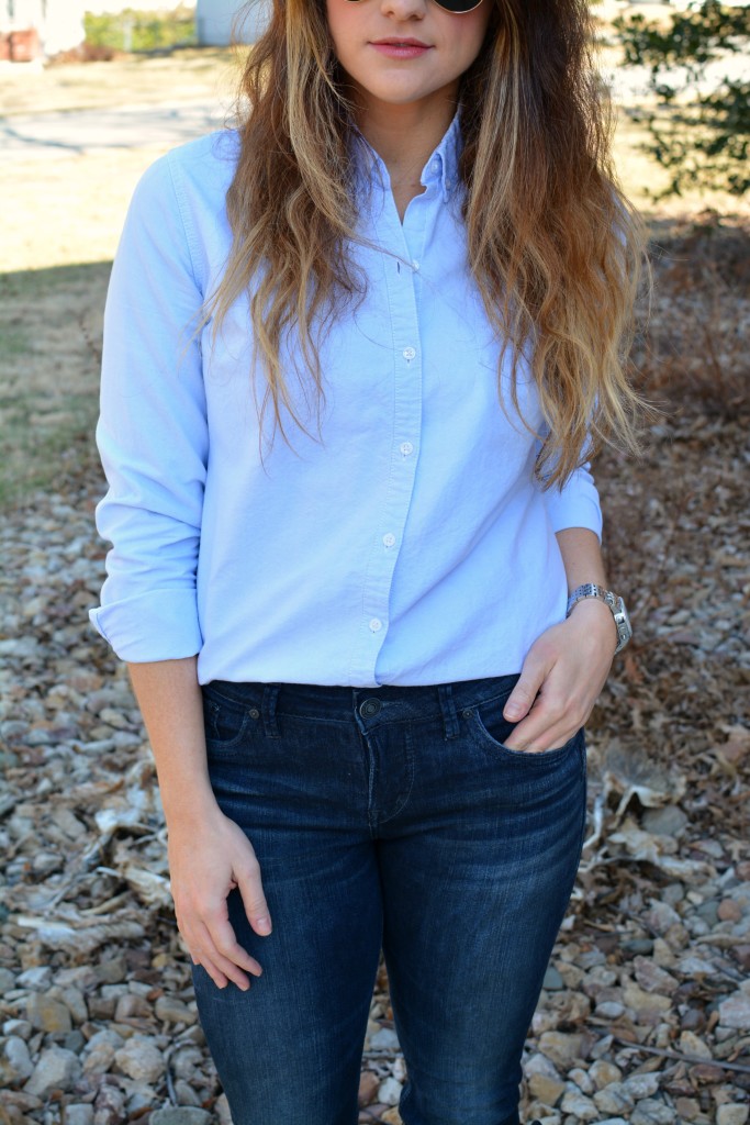 Ashley from LSR in a light blue button-up and Silver jeans.