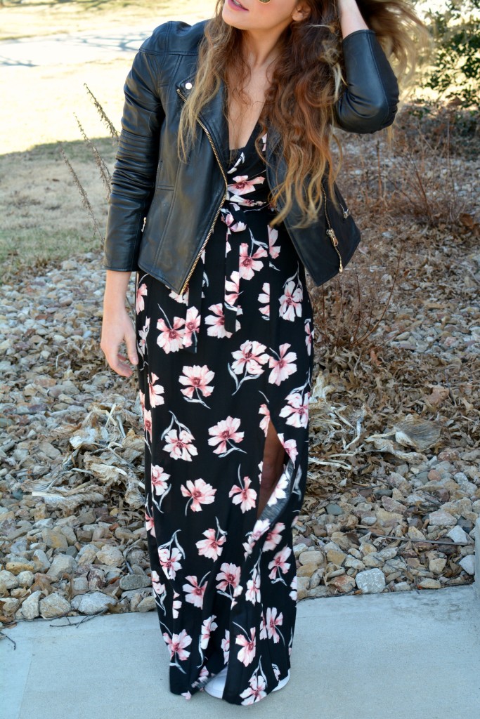 Ashley from LSR in a floral maxi dress, leather jacket, and Stan Smith sneakers