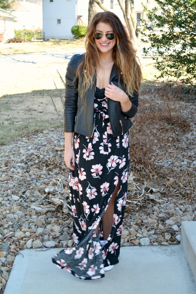 Ashley from LSR in a floral maxi dress, leather jacket, and Stan Smith sneakers