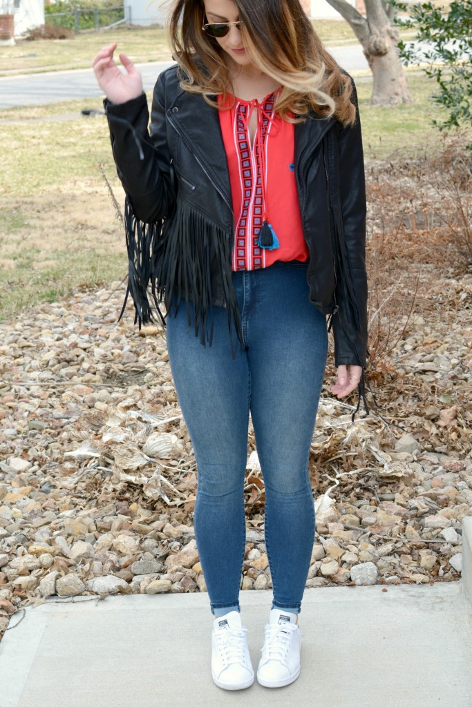 Ashley from LSR in a fringe faux leather jacket, peasant blouse, and Stan Smith sneakers