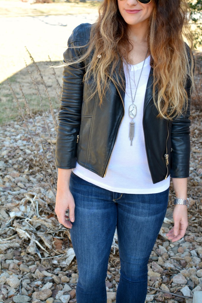 Ashley from LSR in a leather biker jacket and a Kendra Scott Rayne necklace
