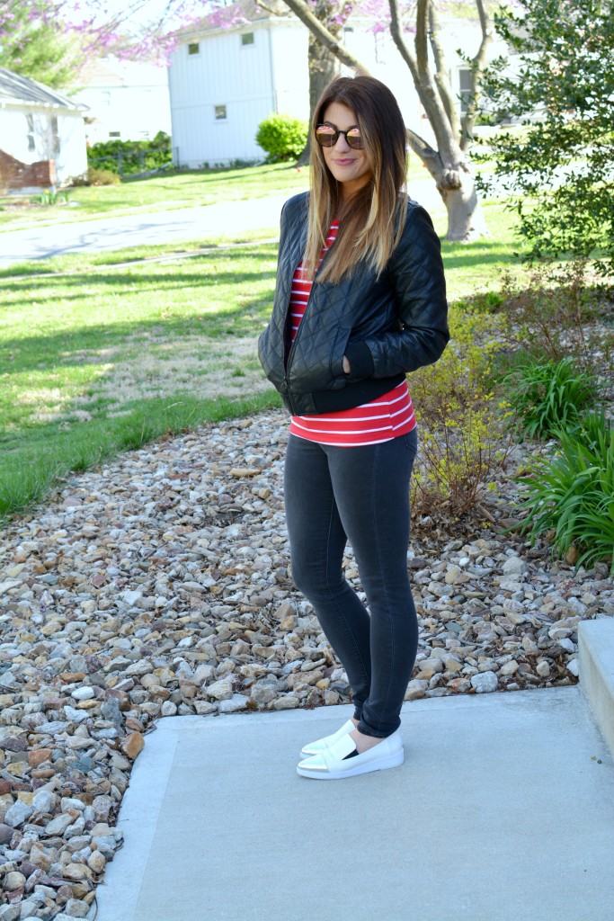 Ashley from LSR in a quilted leather jacket and a red stripe t-shirt