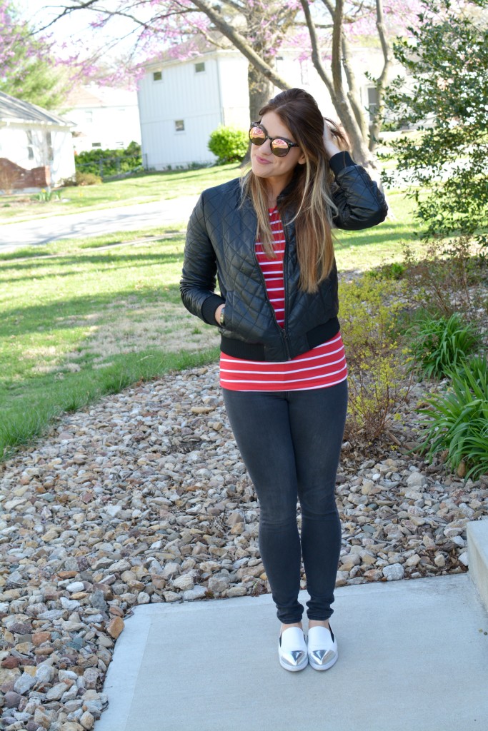 Ashley from LSR in a quilted leather jacket and a red stripe t-shirt