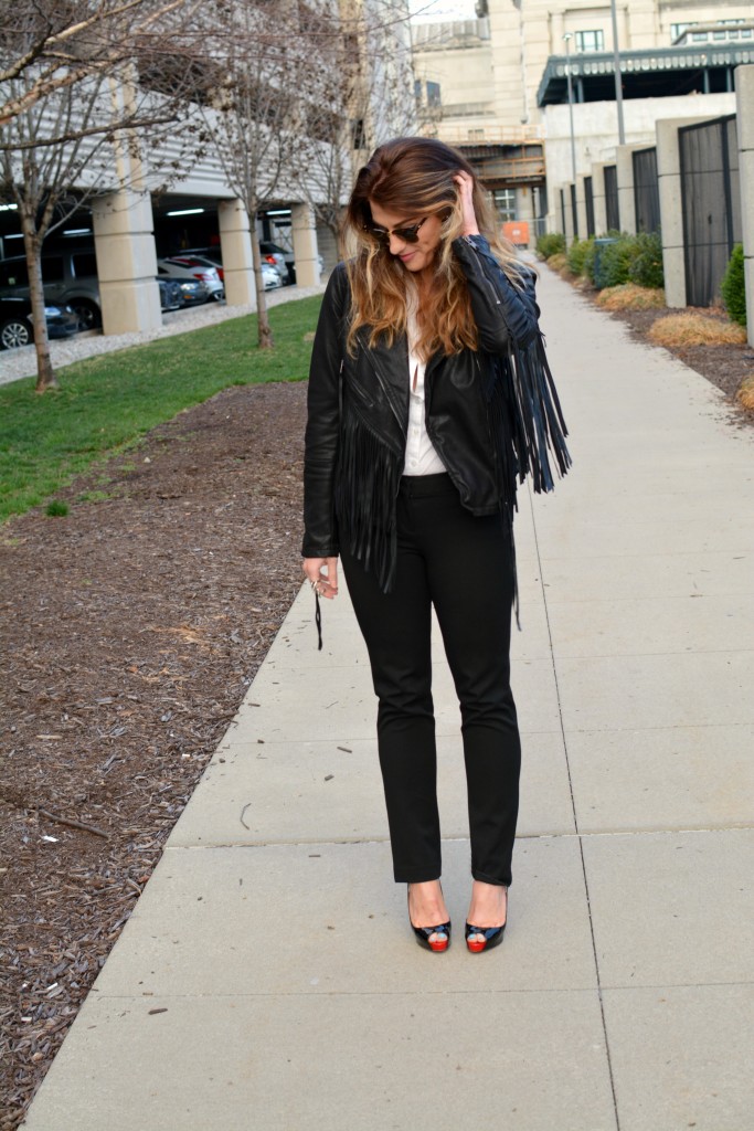 Ashley from LSR in a fringe faux leather jacket and Christian Louboutin pumps for KCFW