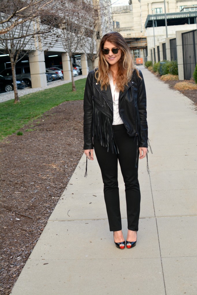 Ashley from LSR in a fringe faux leather jacket and Christian Louboutin pumps for KCFW