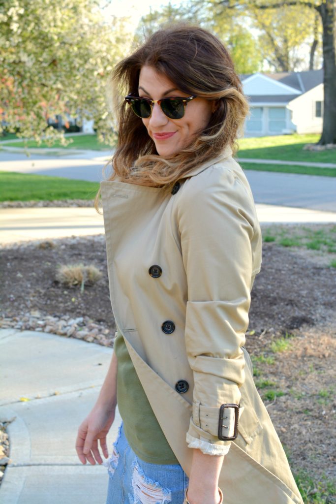 Ashley from LSR in a classic trench coat and a destroyed denim pencil skirt