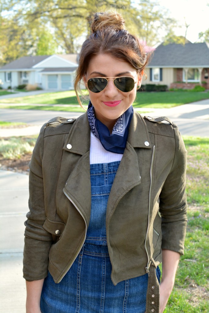 Ashley from LSR in an overall dress, suede jacket,, and a bandanna