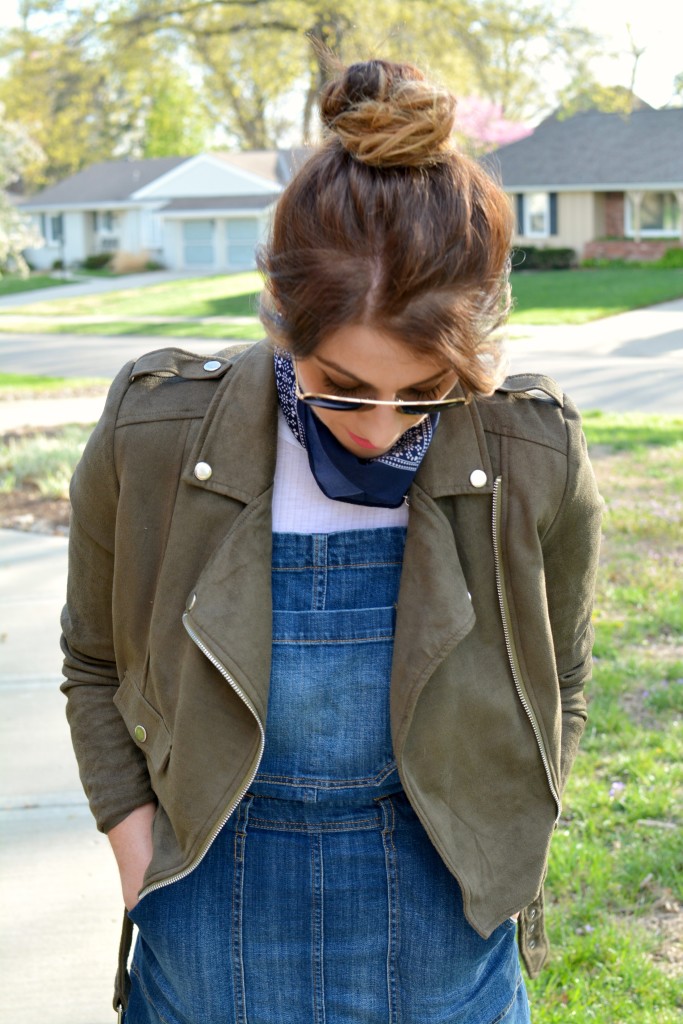 Ashley from LSR in an overall dress, suede jacket,, and a bandanna