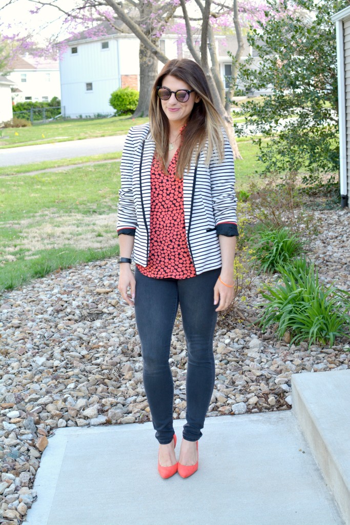 Ashley from LSR in a striped blazer, printed blouse, and bright pumps