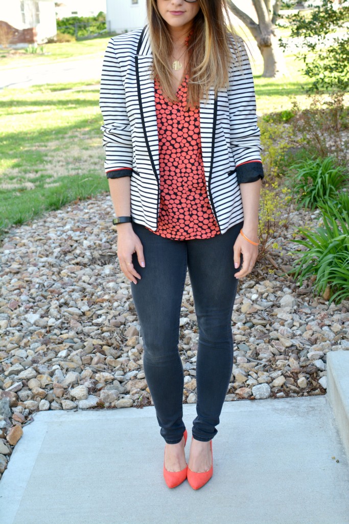 Ashley from LSR in a striped blazer, printed blouse, and bright pumps