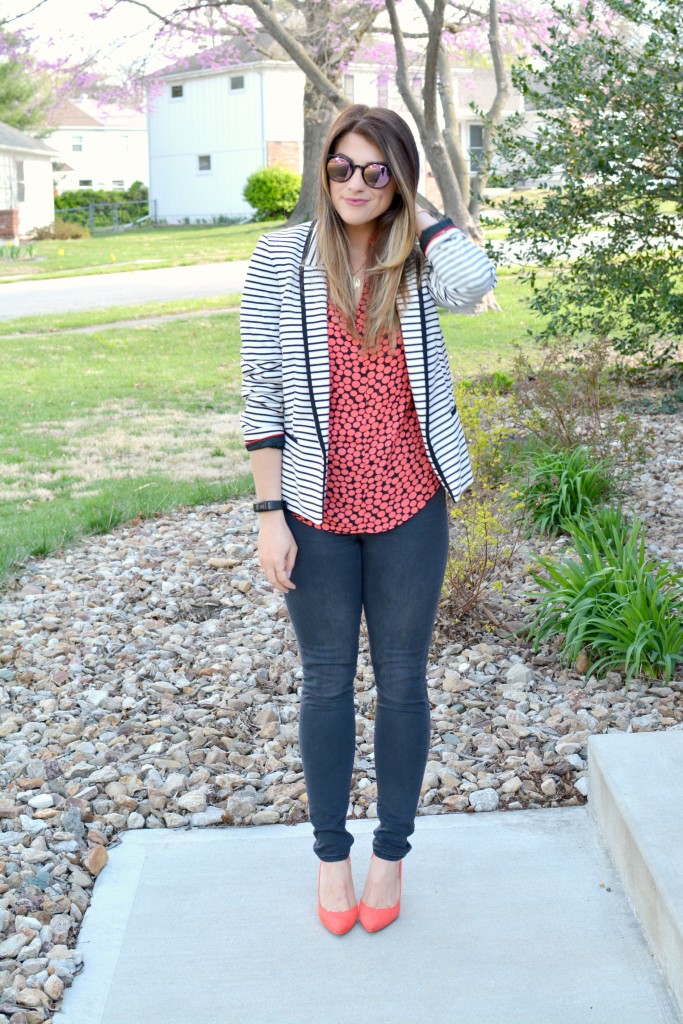 Ashley from LSR in a striped blazer, printed blouse, and bright pumps